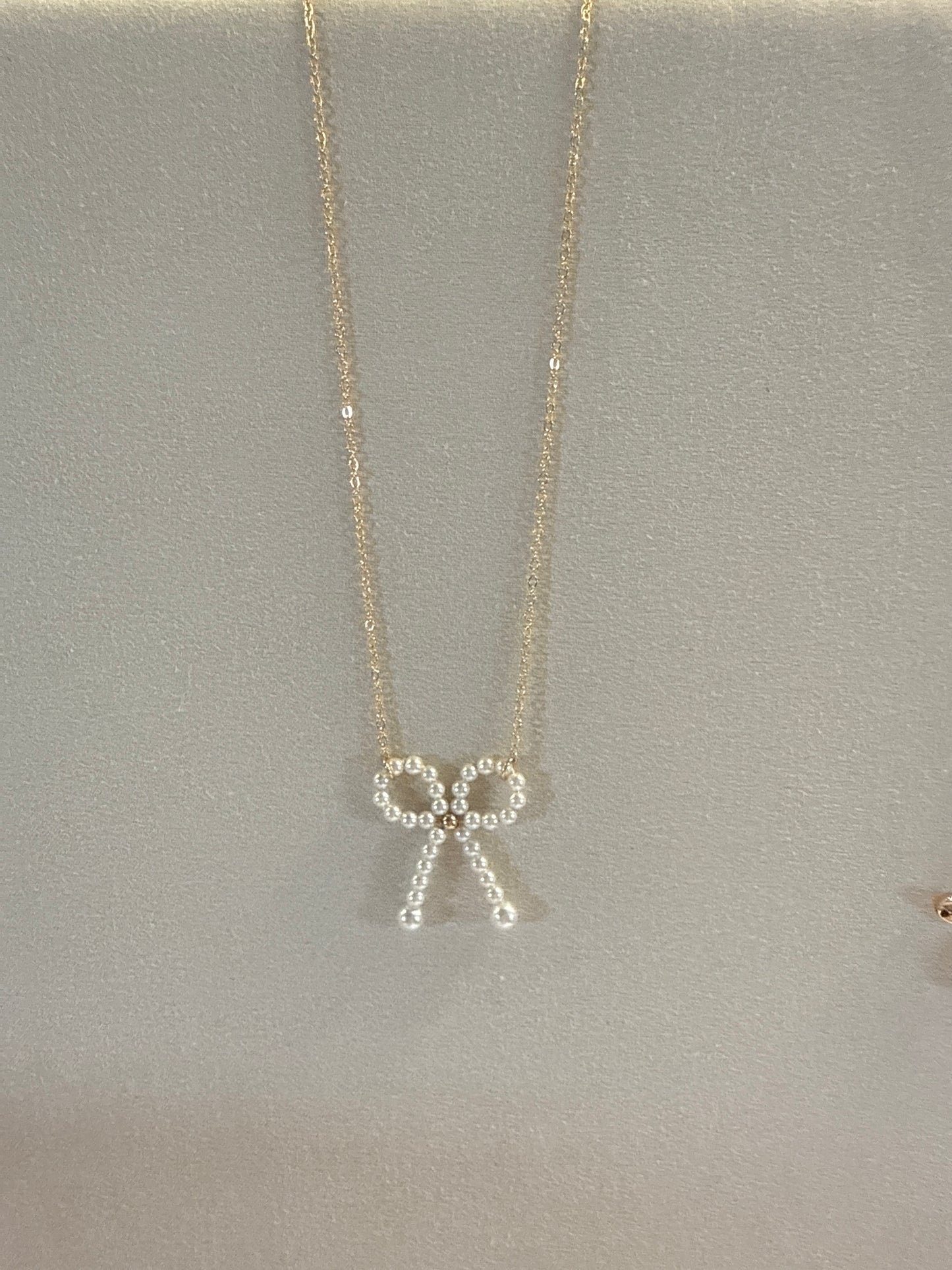 Pearl Bow Pendant Necklace