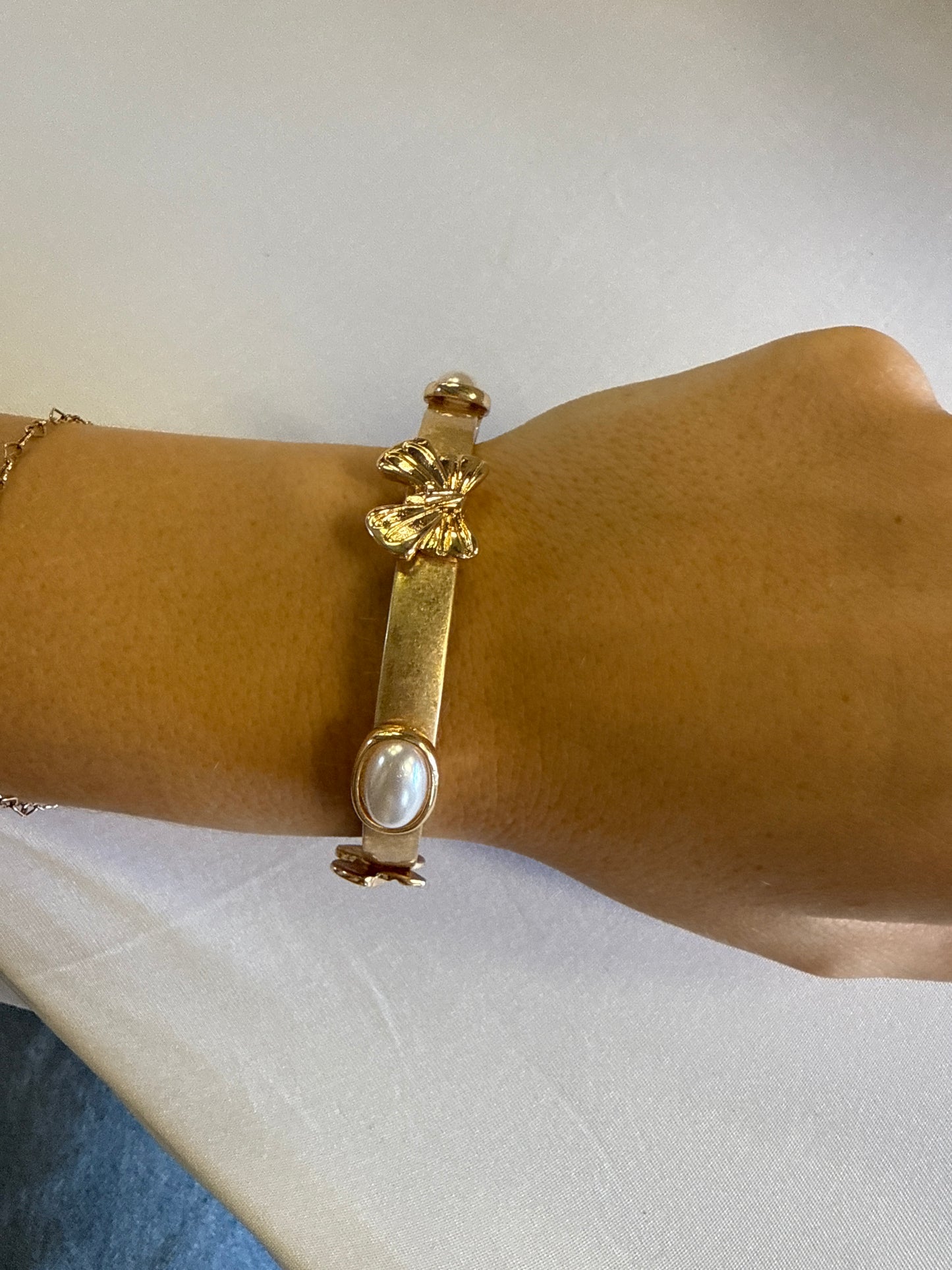 Worn Gold Stretch with Bow & Pearl Accents