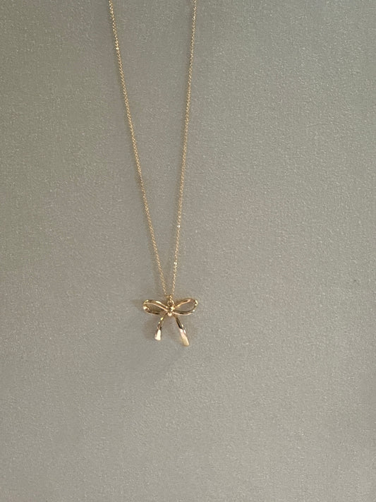Gold Chain with Gold Bow Pendant