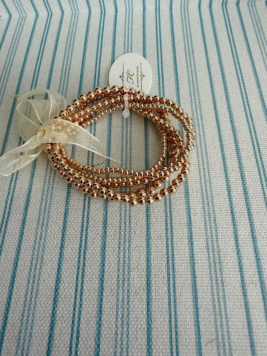 Set of 5 Multi Sized Gold Bracelets