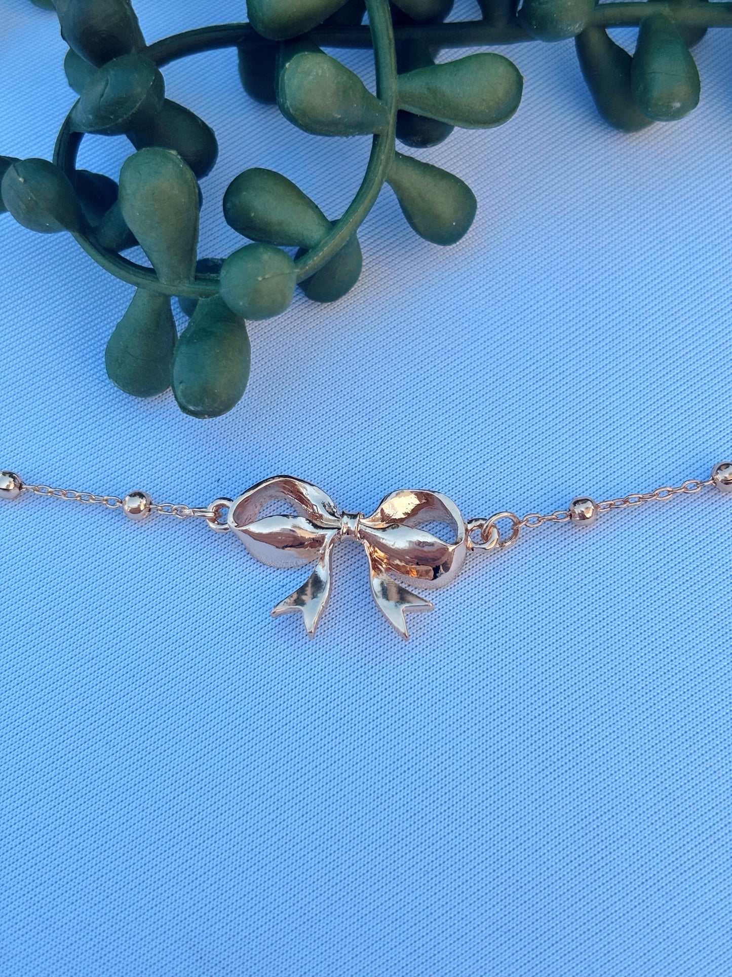 Gold Beaded Bow Necklace