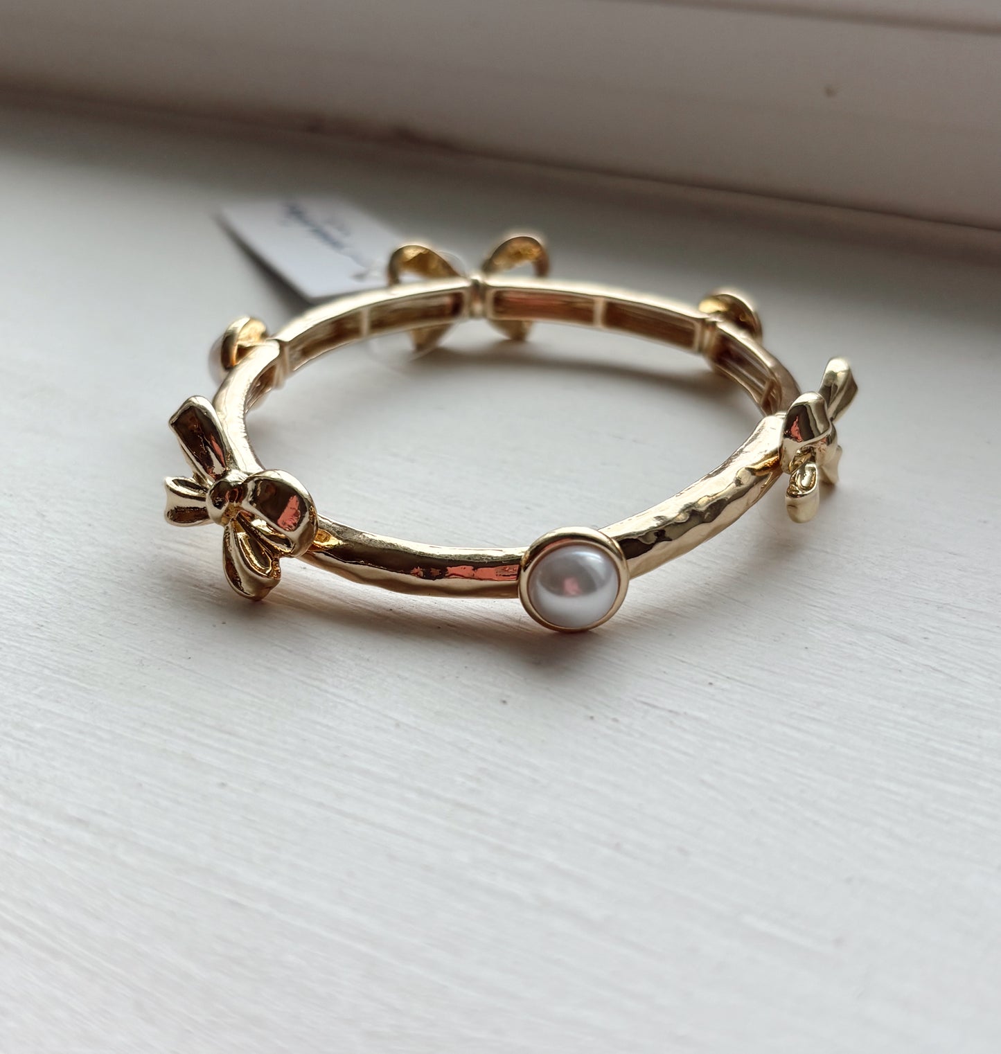 Gold Bow Stretch Bracelet with Oval Pearl Accents