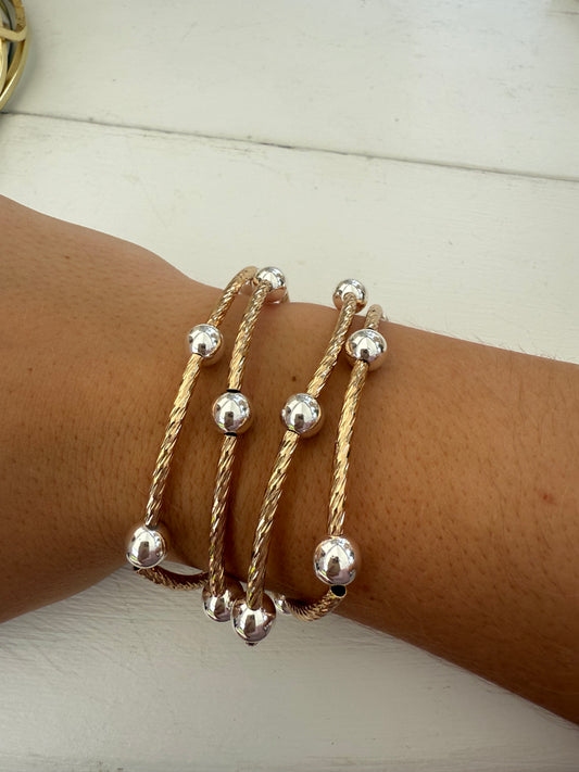 Gold Piping and Stretch Bracelets