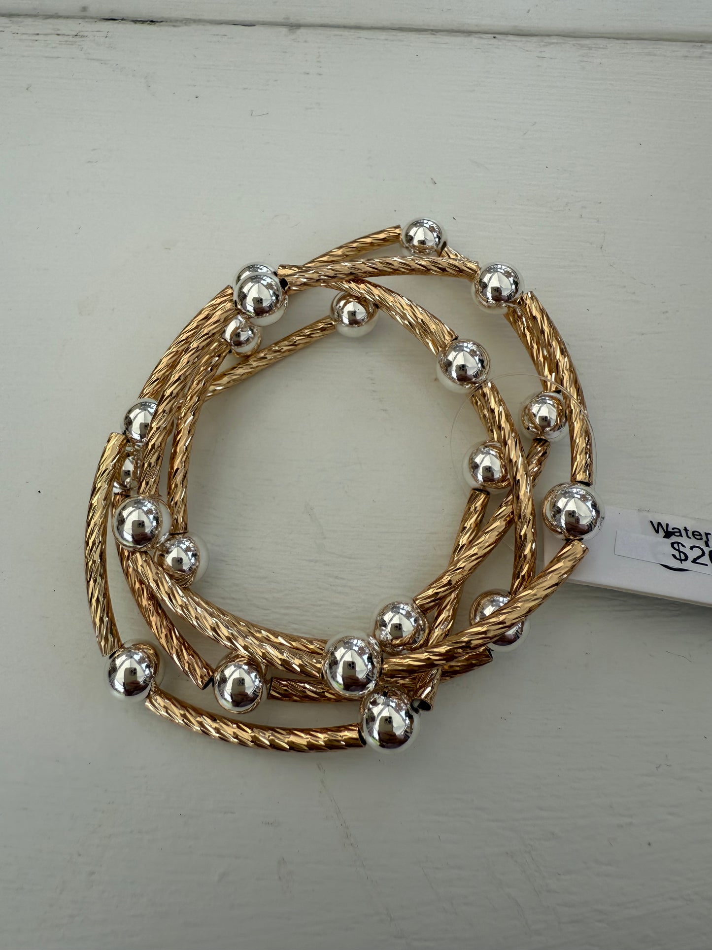 Gold Piping and Stretch Bracelets